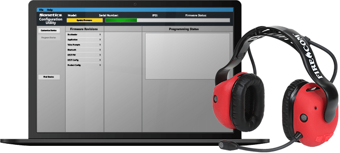 Notebook computer running Configuration Utility software next to a Firecom Wireless Headset.